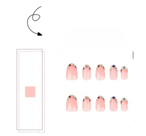 Macro detail of round press-on nails with pink base and colorful sparkling rhinestones