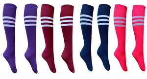 Detail of professional football socks in purple, burgundy, navy and fluorescent pink colors