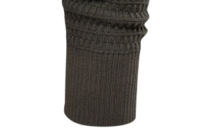 Macro shot of high-density ribbed cuff detail on premium knitwear cardigan in dark grey