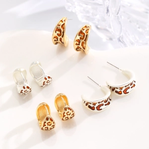 Französische Vintage-Creolen mit Leopardenmuster in Gold und Silber Optik