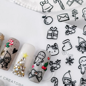 Christmas 3D embossed nail stickers featuring gingerbread man and snowflake hand-drawn designs