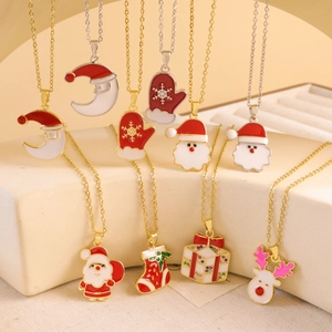 Christmas themed gold plated necklace set with festive charms like reindeer and snowflakes