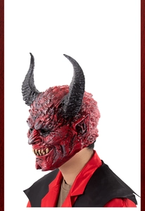 Detailed side view of red demon mask with black horns and realistic latex skin textures