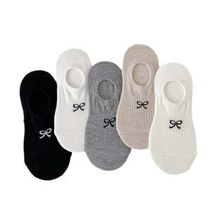 Five pairs of low cut cotton liner socks with bow print in assorted neutral colors