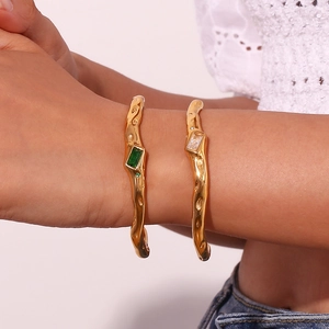 Irregular lava texture 18K gold plated cuff bracelet set with green and white zircon