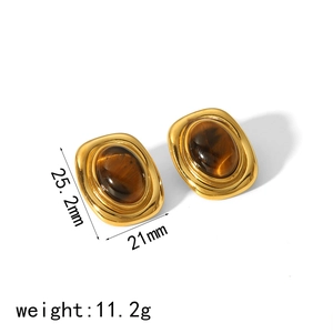 Detailed view of gold earrings with amber tiger eye stones, size 25.2mm and weight 11.2g