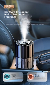 Smart car diffuser with vibration sensor in car cup holder showing mist and premium grey finish