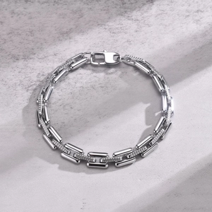 Detailed view of silver stainless steel chain bracelet with secure lobster clasp for men