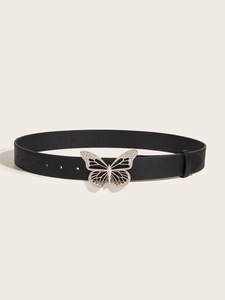 Detail of black leather belt featuring a silver butterfly buckle set with rhinestones