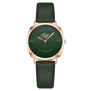 Fashionable dark green leather watch for women with round rose gold case and quartz dial