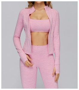 Detail of pink marl sports jacket with functional thumbholes and elastic textured fabric