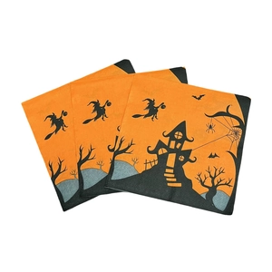 Halloween napkins with orange witch and castle prints for party table decor