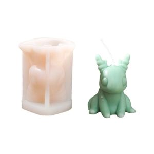 Cartoon dragon silicone mold with green wax candle figure for DIY craft projects