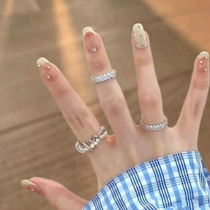 Three-piece silver ring set with micro-pave crystals and pearls for stacked wear