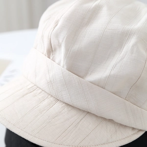 Japanese minimalist beige cotton sun hat with ribbed texture for summer UV protection