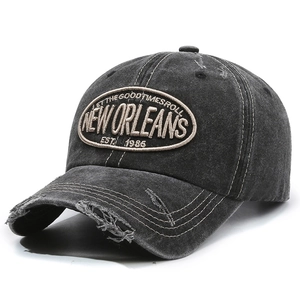 Distressed vintage washed cotton baseball cap with New Orleans embroidery in charcoal grey