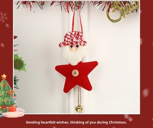 Detail of felt Christmas star ornament with Santa head, wooden button, and gold bell