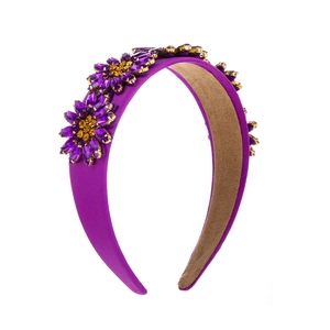 Baroque purple wide fabric headband with rhinestone sunflower decorations on white background
