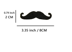 Detailed view of a black faux mustache party prop with 2cm x 8cm size specifications