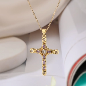 Elegant gold-plated cross necklace with purple marquise gemstones and white zircons