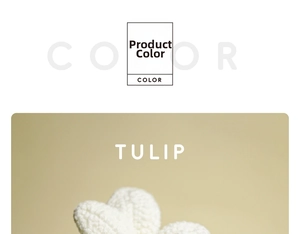 Detailed view of handmade crochet tulip head in cream white with tight knit texture