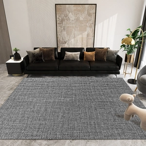 Japanese style gray faux linen rug with woven texture in a modern living room