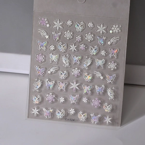 Detailed macro view of laser butterfly and snowflake nail stickers Model Co-124 texture