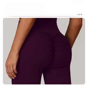 Detail view of high waist yoga pants featuring scrunch butt seam for contouring effect