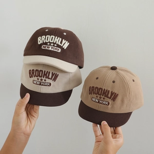 Three Brooklyn corduroy kids baseball caps in contrasting colors with star embroidery