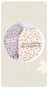 Detail of floral pet base layers with Love Is A Wet Nose text and knit texture
