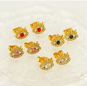 Detailed close-up of evil eye stud earrings with colorful zirconia in gold finish