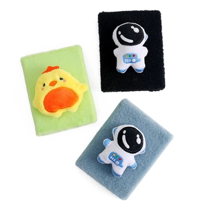 Three plush cartoon notebooks featuring fluffy textures with cute chick and astronaut dolls