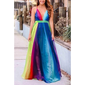 Detail of deep V-neckline and rainbow gradient mesh fabric on a summer maxi dress