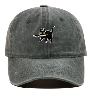 Close-up of vintage washed gray dad hat featuring a black cat with knife embroidery detail