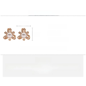 Detail view of rose gold bow earrings with pearls and zircons including size parameters