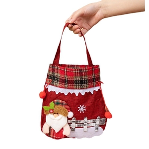 Red Christmas drawstring gift bag with a 3D Santa Claus and plaid trim design
