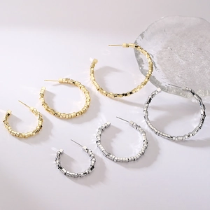 Set of geometric metal hoop earrings in gold and silver finish, multiple sizes available