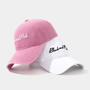 Distressed cotton baseball caps in pink and white with Black and Pink embroidery details