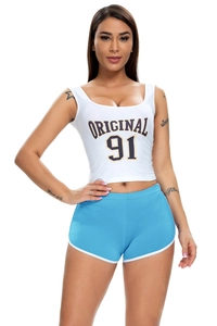 Detailed view of the white racerback tank top and sky blue athletic shorts on model