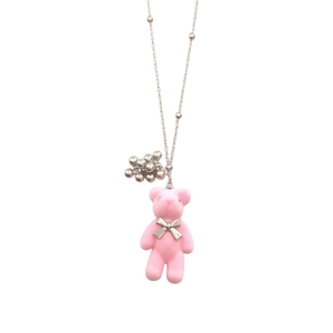 Elegant pink flocked bear necklace with silver bead chain and pearl tassel detail