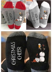 Detailed view of Christmas mid-calf cotton socks with festive snowman and letter patterns