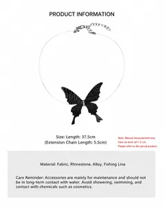 Detail of butterfly choker necklace with black fabric wings and zirconia accents