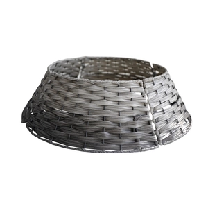 Gray woven Christmas tree collar base with a natural wicker texture on a white background