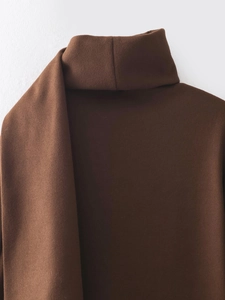 Macro view of high-neck coffee brown wool jacket collar with refined texture