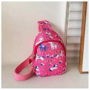 Detailed close-up of a pink nylon kids crossbody bag featuring cute cartoon unicorn patterns