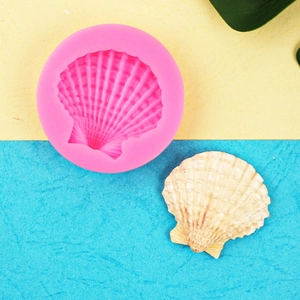Pink silicone starfish and seashell fondant mold for ocean themed cake decoration
