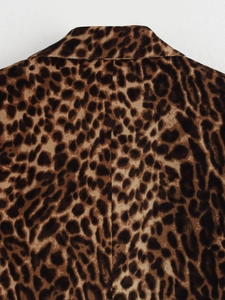 Detailed close-up of the leopard print collar and soft texture on the blazer set