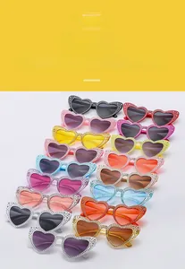 Multiple color options of heart shaped rhinestone sunglasses in a rows