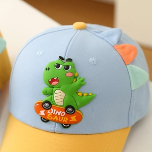 Blue and yellow kids baseball cap featuring a 3D dinosaur on a skateboard detail