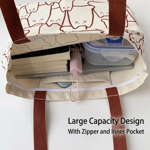 Large capacity canvas tote bag with cat prints showing interior storage and zipper